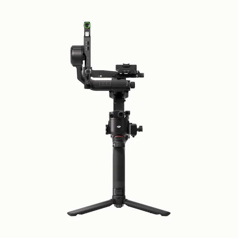 Three-axis handheld gimbal stabiliser standing on its folding tripod base.